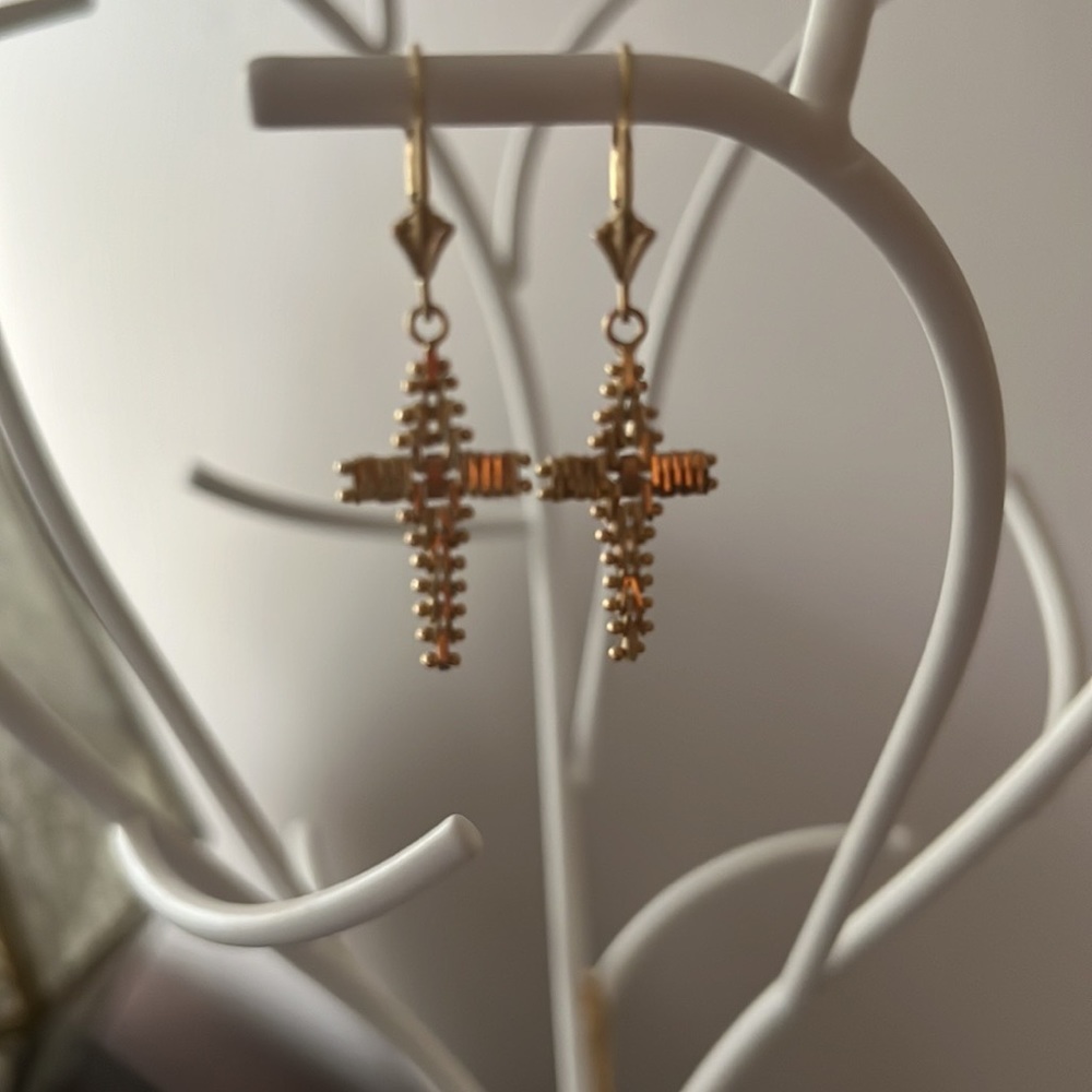 Solid 14k gold cross earrings.